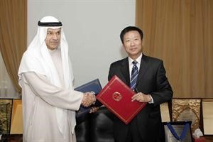 توقيع الاتفاقية بين الكويت والصين
