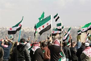محتجون معارضون للنظام السوري يتظاهرون امام سفارته في عمان رويترز