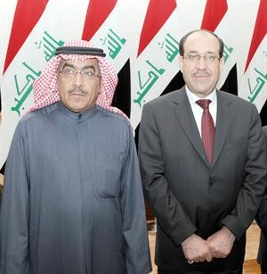 نوري المالكي والزميل عدنان الراشد في لقطة تذكارية﻿