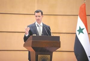 الرئيس السوري بشار الاسد متحدثا من على مدرج جامعة دمشق
