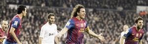 فرحة قائد برشلونة كارليس بويول بهدف الفوز لفريقه في مرمى ريال مدريد في ذهاب ربع نهائي الكاس افپ
