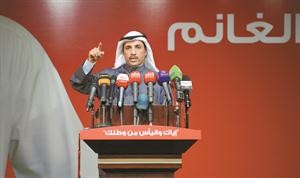 النائب السابق مرزوق الغانم متحدثا خلال افتتاح مقره الانتخابي
