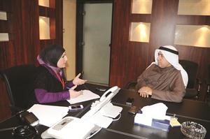 مرشح الدائرة الثالثة م، محمد بوشهري متحدثا للزميلة دارين العلي فريال حماد