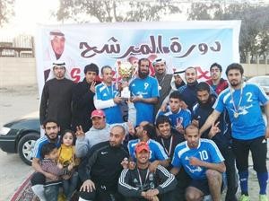 فريق شركة حلويات الفيصل مع الكاس﻿