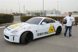 مبارك الرميضي بجانب سيارته نيسان 350 ZX	محمد ماهر﻿