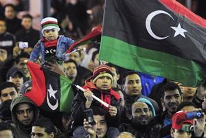 ليبيون خلال الاحتفال بالذكرى الاولى لانطلاق الثورة	افپ﻿