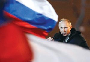 رئيس روسيا المنتخب فلاديمير بوتين باكيا خلال اعلان فوزه	رويترز