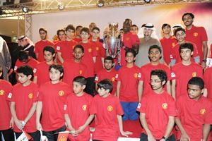 اندي كول وفهد الفهد مع اللاعبين الفائزين محمد ماهر
