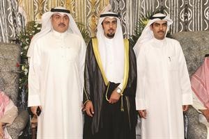 المعرس متوسطا حماد العجمي وخاله الرائد علي الطامي
