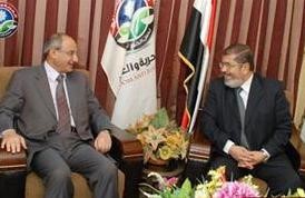 درشيد الحمد خلال لقائه مع دمحمد مرسي﻿