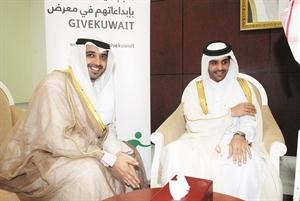 الشيخ محمد العبدالله والشيخ محمد بن عبدالله ال ثاني خلال المعرض﻿