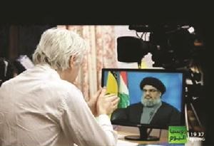 اسانج محاورا السيد نصرالله عبر الشاشة