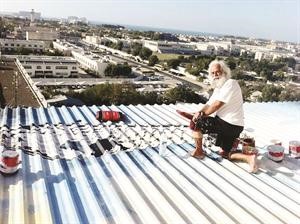 الفنان التشكيلي سهيل ماضي واكبر لوحة جدارية مسطحة في العالم﻿