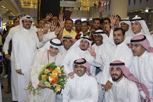 صورة جماعية للبطل ومستقبليه﻿