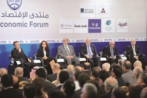 منصة الافتتاح من اليمين د جوزف طربية ورؤوف ابوزكي والرئيس نجيب ميقاتي والرئيس حمادي الجبالي ود نعمت شفيق ورياض سلامة
