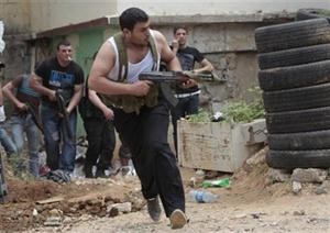صورة نشرها موقع النشرة الاخباري للاشتباكات المسلحة التي وقعت في مدينة طرابلس امس ﻿