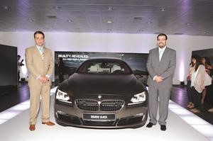 محمد عبدالقادر وعباس اشمر بجوار BMW الفئة السادسة الجديدة فريال حماد