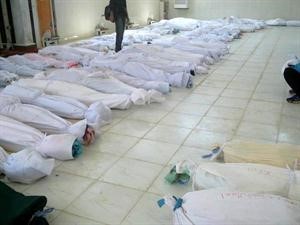 جثامين ضحايا مجزرة النظام السوري في الحولة قبل دفنهم 	افپ﻿