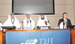 فيصل المطر وعادل الصبيح وديفيد كانون خلال المؤتمر 