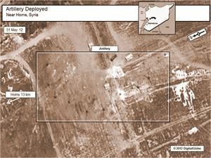 صورة اقمار صناعية تظهر ما تقول واشنطن انها وحدات مدفعية متمركزة حول حمص الخميس الماضي 	رويترز﻿
