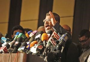 المرشح الرئاسي د محمد مرسي في مؤتمره الصحافي	افپ﻿