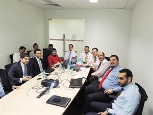 فريق العمل في احد اجتماعاته بماليزيا
