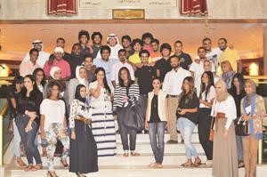 متطوعو ومتطوعات جلوبل اكسبو في لقطة تذكارية﻿