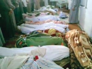 صورة بثها ناشطون لجثث ضحايا مجزرة التريمسة رويترز