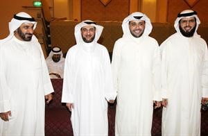 دعادل الدمخي ودمحمد الكندري يتوسطهم الزميل مبارك القناعي