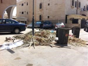 مخلفات انشائية في احد شوارع الفردوس