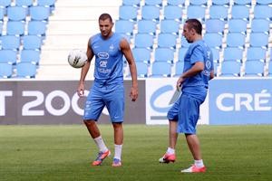 الفرنسيان ريبيري وبنزيمة خلال التدريب