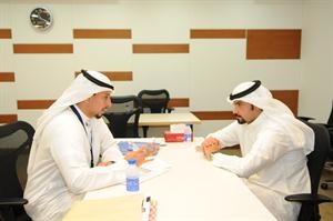 لجنة من جامعة الخليج في مقر بنك بوبيان
