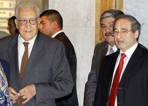 نائب وزير الخارجية السوري فيصل المقداد مستقبلا المبعوث الدولي والعربي الى سورية الاخضر الابراهيميافپ﻿