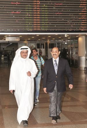 الرئيس جاسم الخرافي ونجله لؤي جاسم الخرافي
