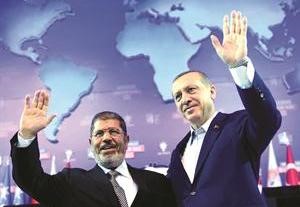 الرئيس المصري د محمد مرسي ورئيس الوزراء التركي رجب طيب اردوغان في افتتاح المؤتمر الرابع لحزب العدالة والتنمية التركي افپ