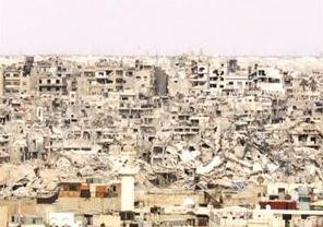 صورة بثها ناشطون للدمار الذي لحق بحي جورة الشياح المجاور لحي الخالدية بحمص