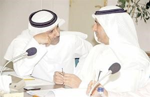 رئيس الهيئة فيصل الجزاف ونائبه دحمود فليطح في اجتماع سابق﻿