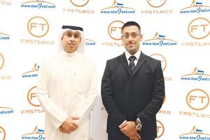 احمد المزيدي وطارق العلي عقب توقيع الاتفاقية
