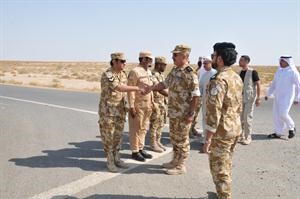 اللواء الشيخ محمد اليوسف مصافحا عددا من ضباط وافراد امن الحدود