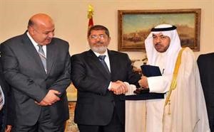 الرئيس دمحمد مرسي خلال استقباله رئيس البرلمان العربي الانتقالي النائب السابق علي الدقباسي﻿