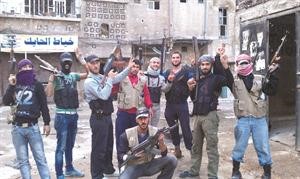 مقاتلو الجيش الحر في شارع التضامن في دمشق رويترز