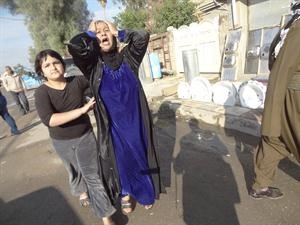 عراقية تبكي ضحايا تفجيرات كركوك	افپ﻿