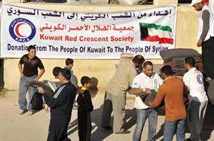 بطانيات وملابس قبل دخول الشتاء للاسر السورية في الاردن