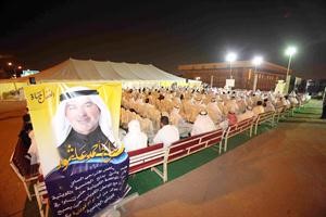  صورة لعاشور متضمنة الشعار الانتخابي