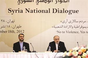 وزير الخارجية الايراني علي اكبر صالحي مترئسا مؤتمر الحوار الوطني السوري في طهران	 افپ﻿