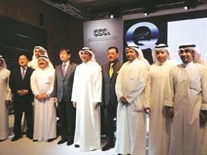 الخالد والسفير الكوري الجنوبي يتوسطان مسؤولي بيتك ومجموعة المطوع
