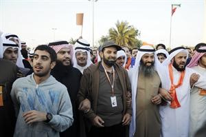 عبدالله البرغش ونايف المرداس ومبارك الوعلان خلال مشاركتهم في مسيرة كرامة وطن 3﻿
