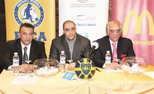 روبن دي نيرو مدير اكاديمية بوكا جونيورز وعادل فهمي مدير التسويق في ماكدونالدز بالمؤتمر الصحافي
