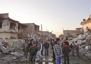 ﻿جانب من الدمار الذي خلفه احد الانفجارات في طوزخرماتو في العراق امس	افپ﻿