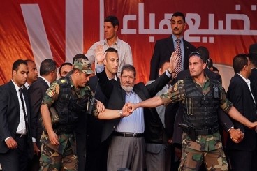 مجلة اميركية تضع محمد مرسي والأسد على رأس قائمة أخطر 10 شخصيات لعام 2012